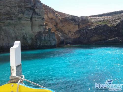 Blue waters in comino during a boat trip